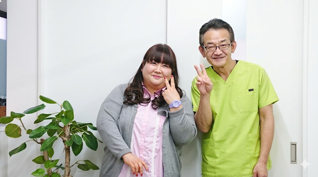 施術後のお客様との写真
